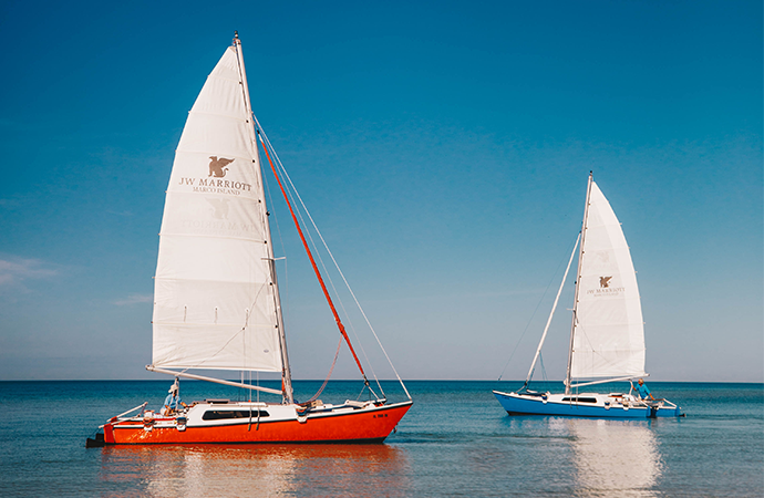 Two JW Marriott sailing boats 